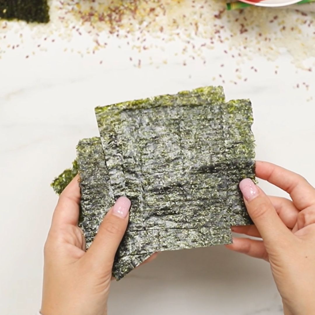 First, I prepare nori and rice.