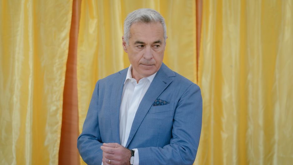 BUCHAREST, ROMANIA - MAY 4: Former presidential candidate Calin Georgescu prepares to make a statement, on May 4, 2025 in Mogosoaia, Romania. The first round of voting begins in the re-run of Romania's presidential election after six months since the original ballot was cancelled due to evidence of Russian influence on the outcome.  Then far-right candidate Calin Georgescu surged from less than 5% days before the vote to finish first on 23% despite declaring zero campaign spending. He was subsequently banned from standing in the re-rerun, replaced this time round by George Simion who claims to be a natural ally of Donald Trump. (Photo by Andrei Pungovschi/Getty Images)