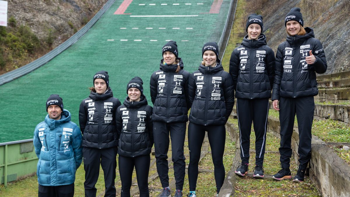 KRANJ, SLOVENIA - 2021/11/23: Slovenian women's ski jumping national team and their coach Zoran Zupancic pose for a photo after training before the start of the women's ski jumping season.The team trains before departing for the first women's ski jumping competition in Nizhny Tagil in Russia. (Photo by Luka Dakskobler/SOPA Images/LightRocket via Getty Images)