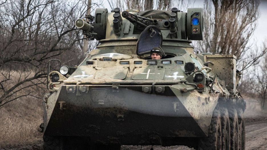 Temporary
Ukrainian servicemen drive an armoured vehicle on the outskirts of Bakhmut, eastern Ukraine on December 30, 2022. (Photo by Sameer Al-DOUMY / AFP)
SAMEER AL-DOUMY