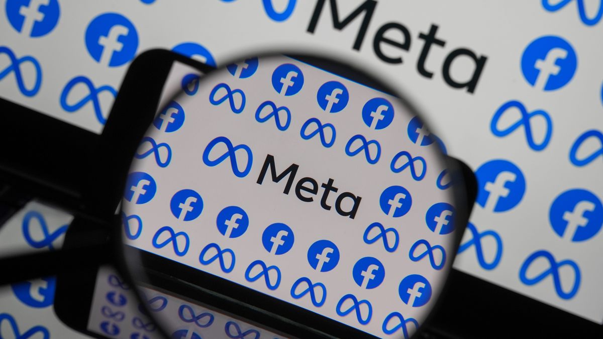 ANKARA, TURKIYE - JANUARY 25: In this photo illustration Facebook and Meta logos are displayed on mobile phone screens seen through a magnifying glass in Ankara, Turkiye on January 25, 2025. (Photo by Dilara Irem Sancar/Anadolu via Getty Images)