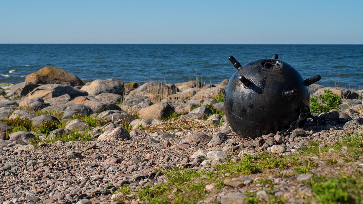 Part of World War II memorial monument placed at Juminda peninsula, Estonia. Metal bullets (defused naval mines) linked by chains.Rocky seaside.Aimur Kytt