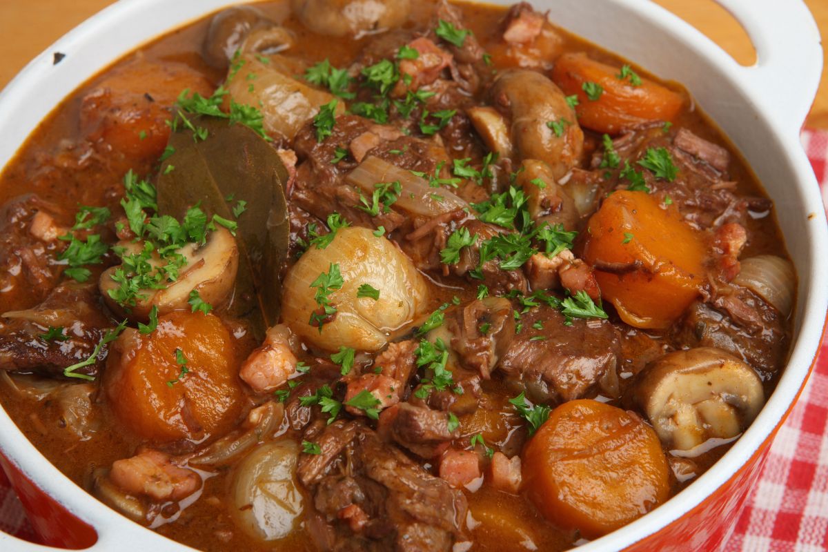 What should be done to make the meat in the stew tender?