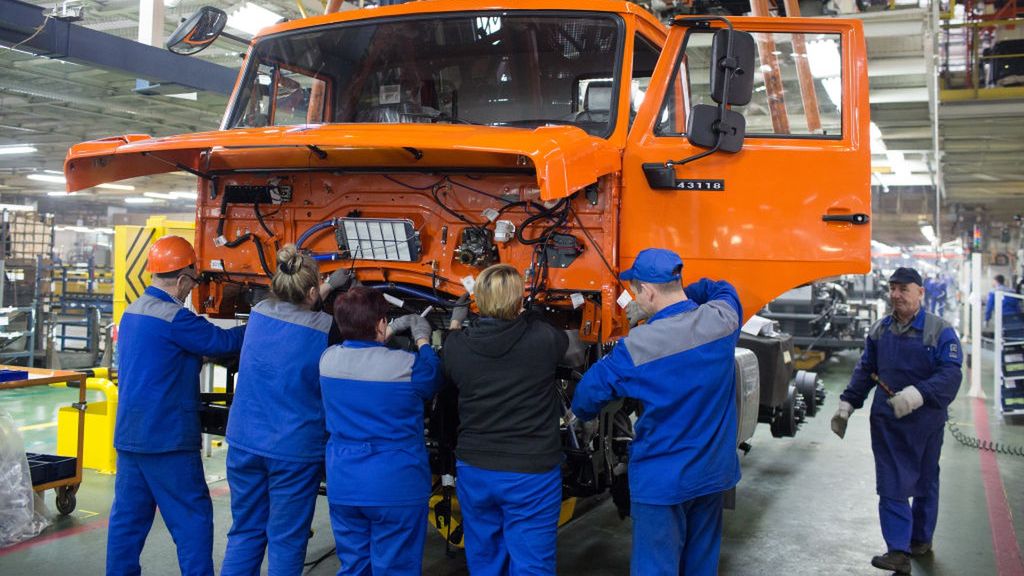 Truck Manufacture At Kamaz PJSC
Workers fit a cabin to a truck chassis on the production line at the Kamaz PJSC plant in Naberezhnye Chelny, Russia, on Wednesday, Jan. 29, 2020. Kamaz has forecast vehicle sales of 35,709 in 2020, of which 29,000 units will be delivered to the Russian market. Photographer: Andrey Rudakov/Bloomberg via Getty Images
Bloomberg
fabrication, russian, bric countries, emea, industries, manufactured goods, transportation and logistics, business news, automotive