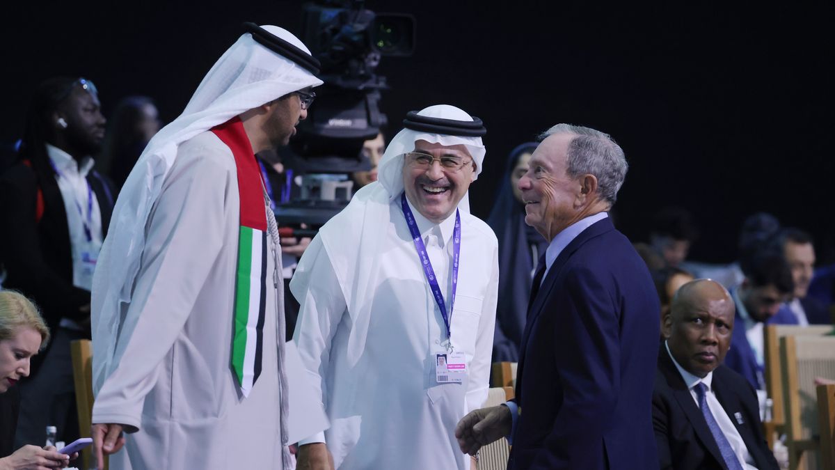 DUBAI, UNITED ARAB EMIRATES - DECEMBER 02: Michael Bloomberg (R) shares a laugh with Sultan Ahmed Al Jaber (L), President of the UNFCCC COP28 Climate Conference, and Amin Nasser (C), CEO of Saudi Aramco, prior to a presentation of the Industrial Transition Accelerator during day two of the high-level segment of the UNFCCC COP28 Climate Conference at Expo City Dubai on December 02, 2023 in Dubai, United Arab Emirates. The COP28, which is running from November 30 through December 12, brings together stakeholders, including international heads of state and other leaders, scientists, environmentalists, indigenous peoples representatives, activists and others to discuss and agree on the implementation of global measures towards mitigating the effects of climate change. (Photo by Sean Gallup/Getty Images)