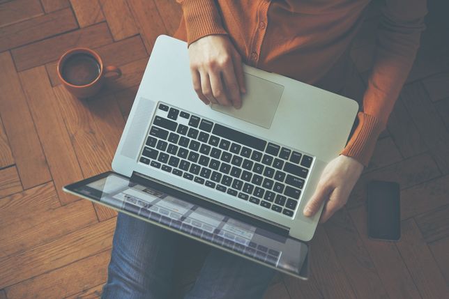 Laptop,In,Girl's,Hands,Sitting,On,A,Wooden,Floormobility,education,smartphone,woman,data,global,networking,instagram,laptop,type,space,holding,communications,computer,beverage,above,working,connection,communication,floor,hand,digital,keyboard,using,wifi,business,break,social,technology,drink,room,home,phone,wooden,coffee,desk,letter,wireless,device,workplace,internet,mug,cup