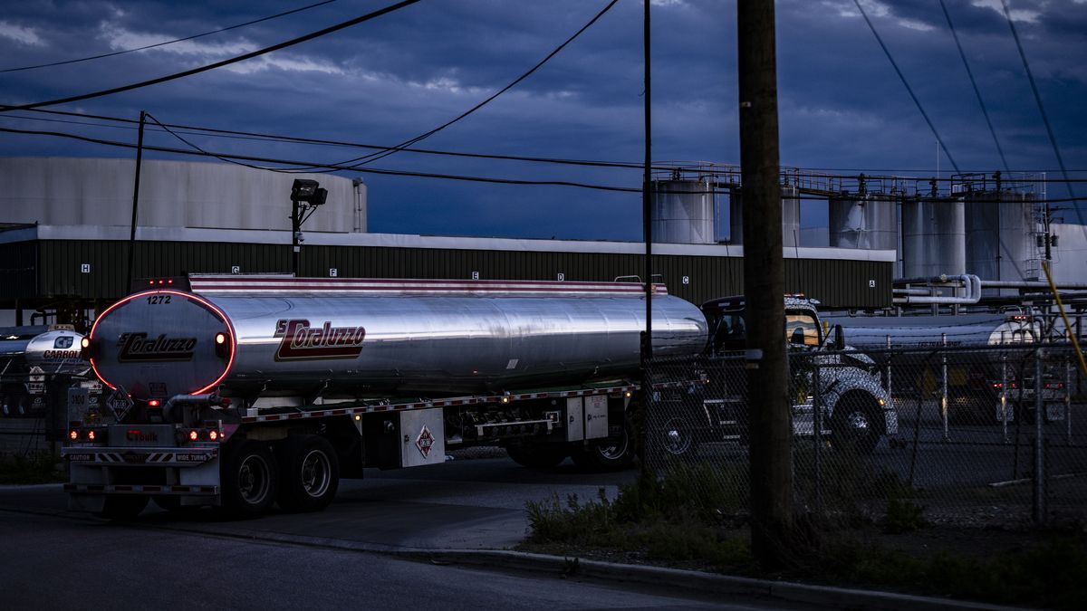 Tanker trucks pull into a distribution facility connected to the Colonial Pipeline Co. system in an industrial area of the Port of Baltimore in Baltimore, Maryland, U.S., on Tuesday, May 11, 2021. Fuel shortages are expanding across several U.S. states in the East Coast and South as filling stations run dry amid the unprecedented pipeline disruption caused by a criminal hack. Photographer: Samuel Corum/Bloomberg via Getty Images