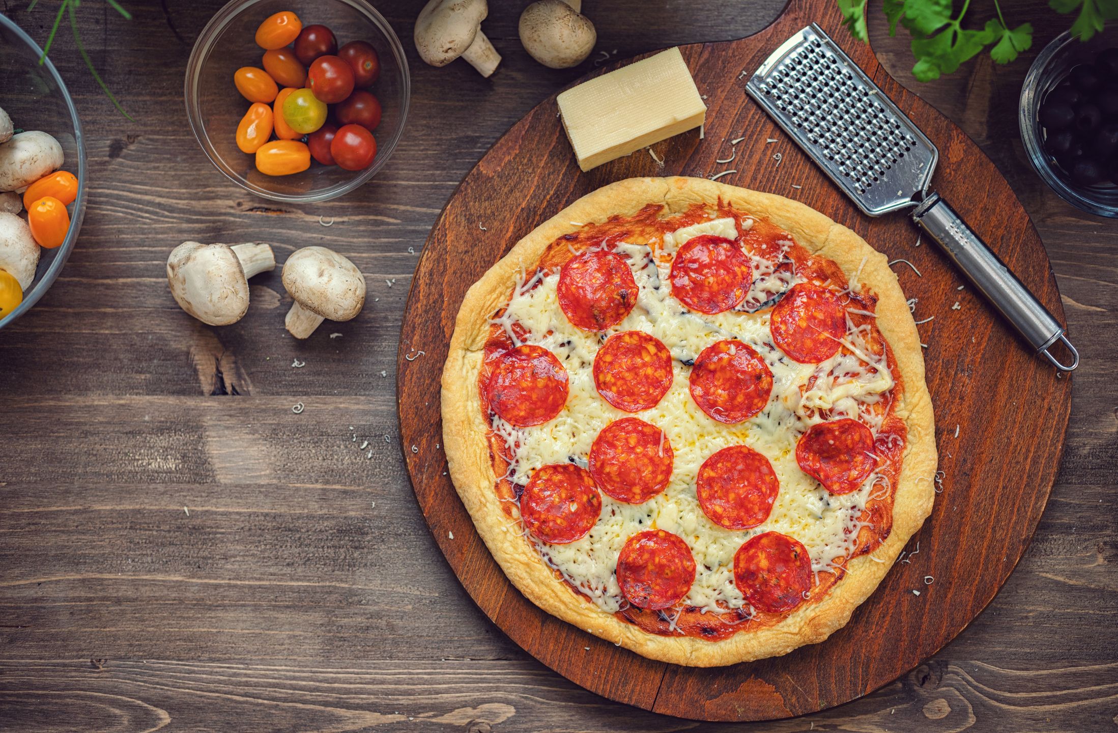Freshly baked homemade pepperoni pizza with melted mozzarella