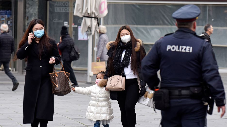 VIENNA, AUSTRIA - NOVEMBER 16: People wearing protective face masks walk on Stephansplatz the day before a strict nationwide lockdown is to go into effect on November 16, 2020 in Vienna, Austria. Starting tomorrow shops and businesses must close, schools may only operate remotely and people must stay indoors at home except for the most necessary outings. Additionally health authorities plan to soon launch mass Covid testing for the entire country. (Photo by Thomas Kronsteiner/Getty Images)