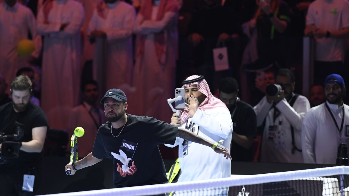 RIYADH, SAUDI ARABIA - OCTOBER 16: Brazilian football player Neymar hits a ball after a talk with Carlos Alcaraz (not seen) of Spain during the quarter-final match against Holger Rune (not seen) of Denmark on day one of the Six Kings Slam 2024 at Kingdom Arena in Riyadh, Saudi Arabia on October 16, 2024. (Photo by Mohammed Saad/Anadolu via Getty Images)