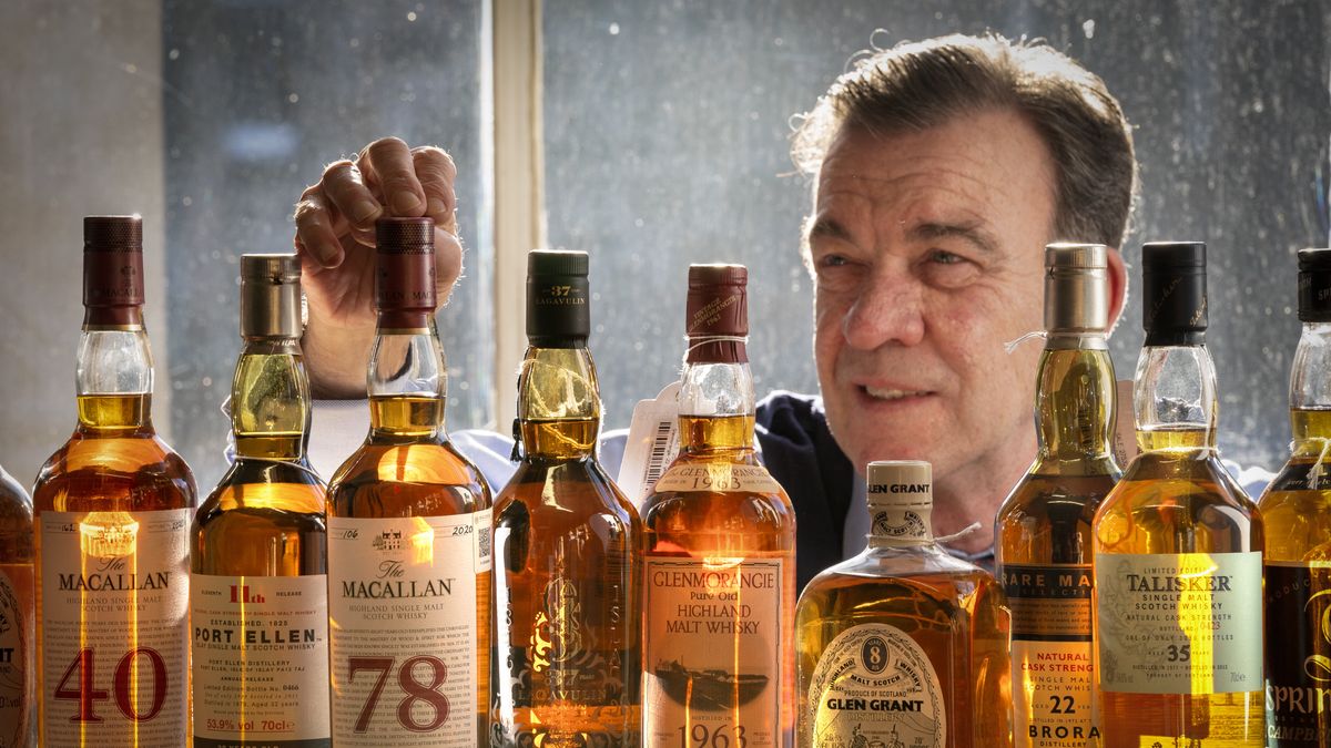 Bonhams' Head of Whisky Martin Green inspects a bottle of one of the oldest known Macallan Scotch Whiskys ever produced, The Macallan-78 year old, which leads Bonhams Whisky sale in Edinburgh on Wednesday March 10. Picture date: Tuesday March 1, 2022. (Photo by Jane Barlow/PA Images via Getty Images)