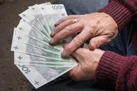An elderly man holds Polish money, a pension, in his hands.
An elderly man holds Polish money, a pension, in his hands.
Robert  Blaszkowski
pay, bank, 100, cash, hundred, finances, money