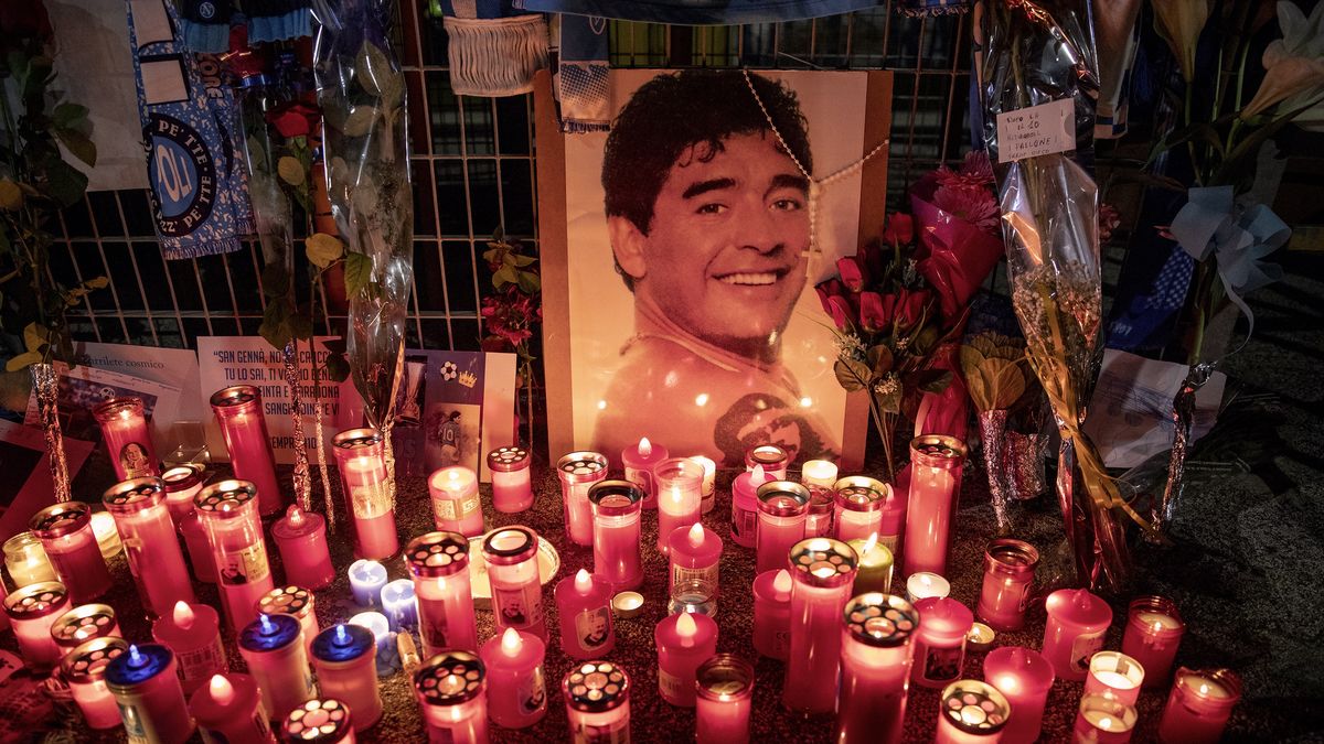 NAPLES, ITALY - NOVEMBER 26: A picture of the Argentine soccer legend Diego Armando Maradona outside San Paolo stadium after the announcement of his death in Naples, Italy on November 26, 2020. (Photo by Alessio Paduano/Anadolu Agency via Getty Images)