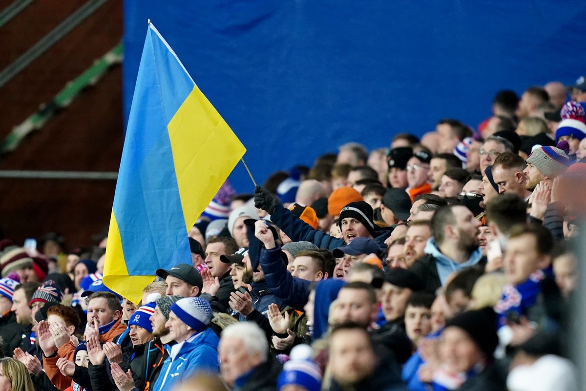 Rangers fans with a Ukrain flag during the UEFA Europa League round of sixteen first leg match at Ibrox Stadium, Glasgow. Picture date: Thursday March 10, 2022. (Photo by Jane Barlow/PA Images via Getty Images)