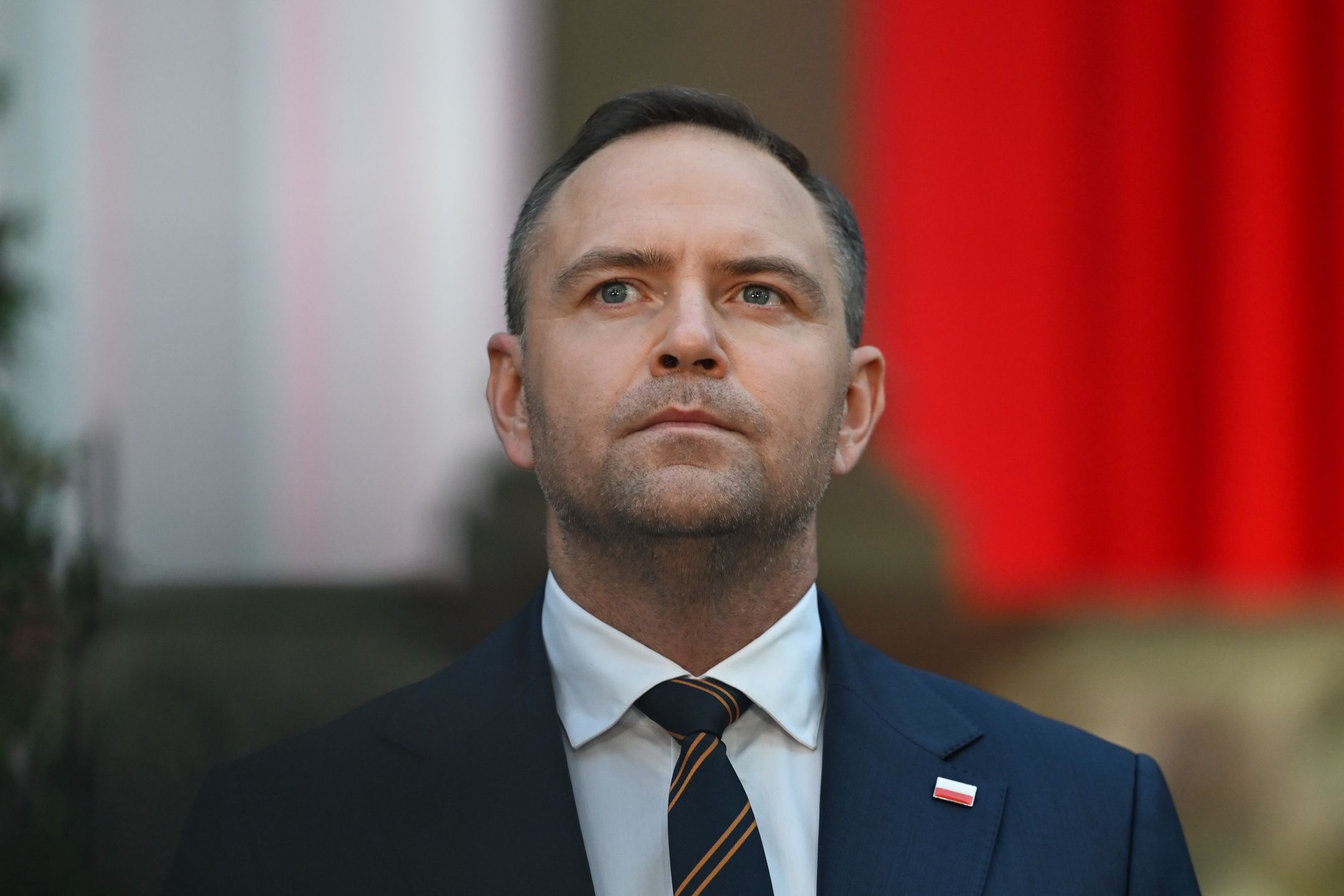 WARSAW, POLAND  AUGUST 14:Newly sworn-in Polish President Karol Nawrocki, Commander-in-Chief of the Polish Armed Forces, attends a solemn 'Appeal of Remembrance' ceremony with candle lighting at the Monument to the Fallen from the 1920 Battle of Warsaw in Powazki Military Cemetery as part of Poland's Armed Forces Day commemorations, in Warsaw, Poland, on August 14, 2025., in Warsaw, Poland, on August 14, 2025. (Photo by Artur Widak/NurPhoto via Getty Images)