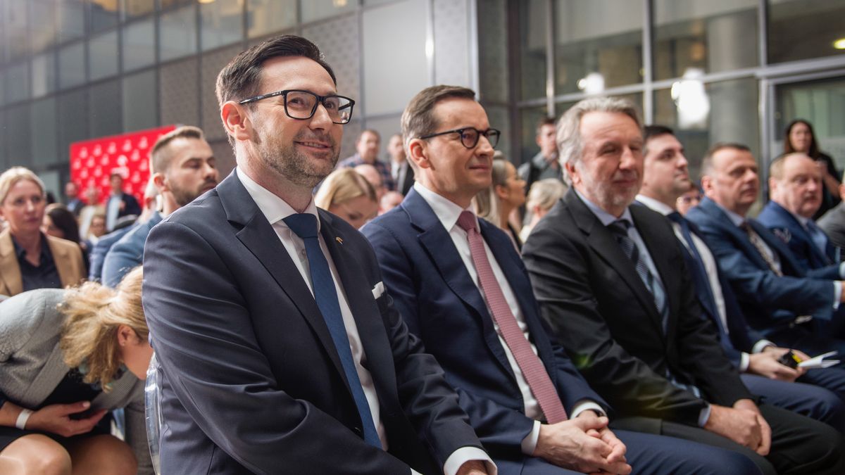 WARSAW, POLAND - 2023/04/17: Daniel Obajtek (L), the President and CEO of the Polish Oil Company ORLEN and Prime Minister Mateusz Morawiecki (M) seen at the press conference in Warsaw. Daniel Obajtek, the President and CEO of the Polish Oil Company ORLEN, announced the details of the planned investments in Small Modular Reactors (SMR) for Poland. For this purpose, the company Orlen Synthos Green Energy (OSGE) was established, supported by the Polish billionaire - Michal Solowow. OSGE will buy reactors from US-based GE Hitachi. (Photo by Attila Husejnow/SOPA Images/LightRocket via Getty Images)