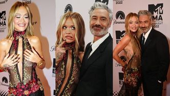 MTV EMA 2022. Rita Ora pozuje w koronkowej sukience z dekoltem aż do pępka u boku starszego o 15 lat męża