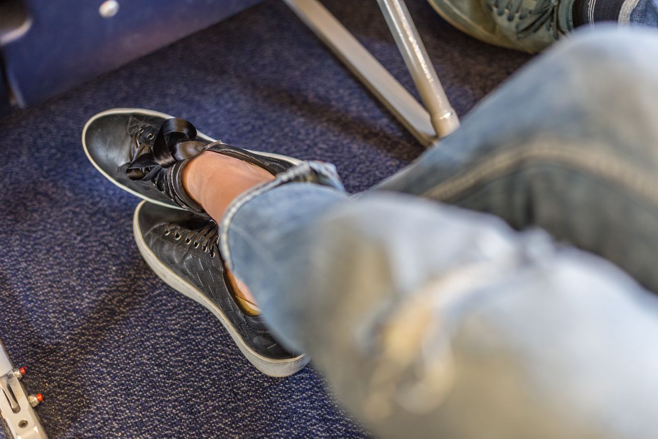 Taking off shoes on a plane can elicit different reactions from fellow passengers.