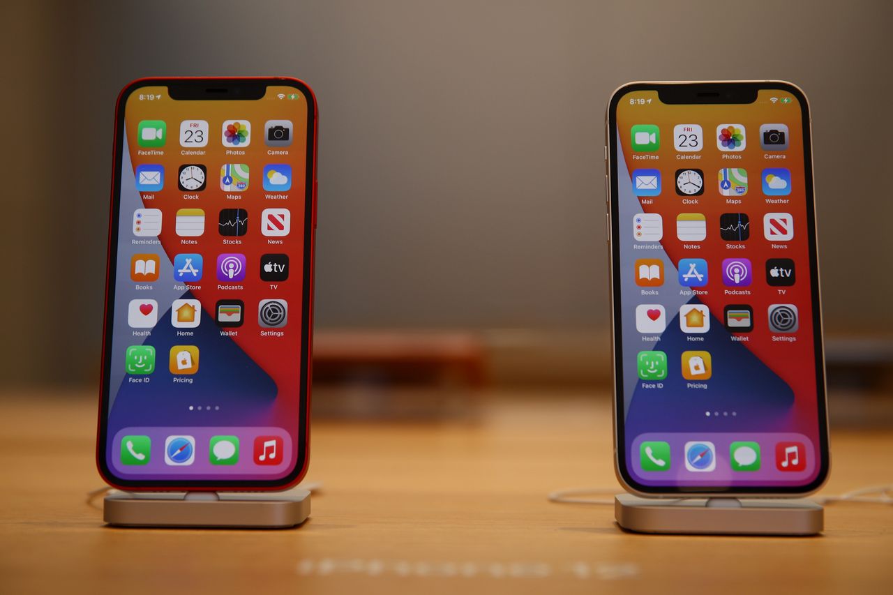 SYDNEY, AUSTRALIA - OCTOBER 23: iPhone 12  product is seen displayed  inside the George St Apple Store on October 23, 2020 in Sydney, Australia. The iPhone 12 features the A14 Bionic chip CPU, 6.1 inch OLED display, 5G connectivity and an advanced dual-camera system. The iPhone 12 Pro has a 6.1 inch OLED Super Retina XDR display and features triple rear cameras including an Ultra Wide camera and a telephoto camera along with the A14 Bionic chip CPU and 5G connectivity. (Photo by Don Arnold/WireImage)