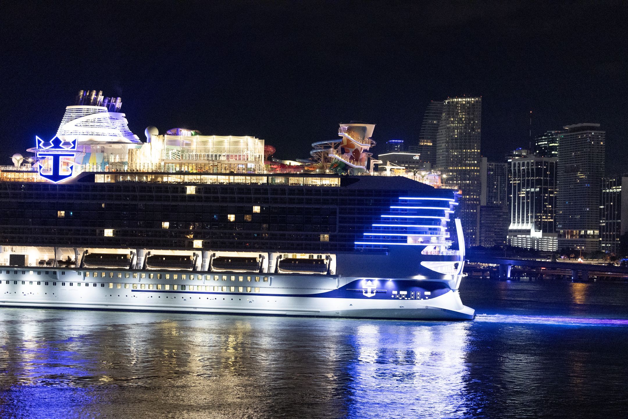 MIAMI, FLORIDA - FEBRUARY 03: Royal Caribbean's Icon of the Seas, billed as the world's largest cruise ship, uses the turn basin as it prepares to dock at PortMiami on February 03, 2024, in Miami, Florida. The 1,197-foot long ship cost $1.79 billion to build, has 20 decks, and can hold a maximum of 7,600 people. (Photo by Joe Raedle/Getty Images)