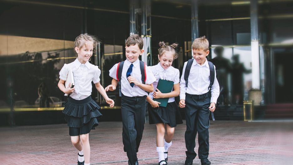 Beautiful school children active and happy on the background of school in uniformschool,kids,running,children,group,elementary,people,happy,home,schoolchildren,time,end,caucasian,space,ethnic,horizontal,primary,copy,classmates,pupils,friends,friendship,view,fun,backpack,grade,boys,bag,students,usa,full,hispanic,energetic,childhood,row,girls,multi,ethnicity,together,communication,friends,uniform,variety,help,change,back to school,horizontal,first