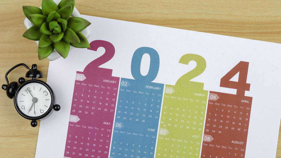 Top views of the Desk Calendar 2024:  Calendar is used to plan daily work and life with houseplant and alarm clock against a wooden table background.
Top views of the Desk Calendar 2024:  Calendar is used to plan daily work and life with houseplant and alarm clock against a wooden table background.
Pakin Songmor