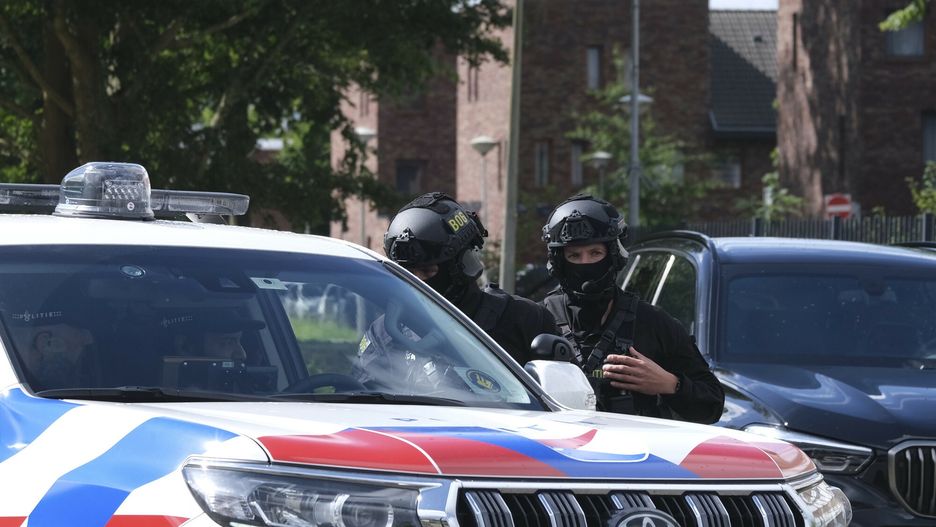 Temporary
Armed police patrol outside a top security Amsterdam courthouse, Wednesday June 12, 2024, ahead of the verdicts in the trial of nine men suspected of involvement in the assassination three years ago of popular campaigning journalist Peter R. de Vries on a busy Amsterdam street. (AP Photo/Mike Corder)
Mike Corder
