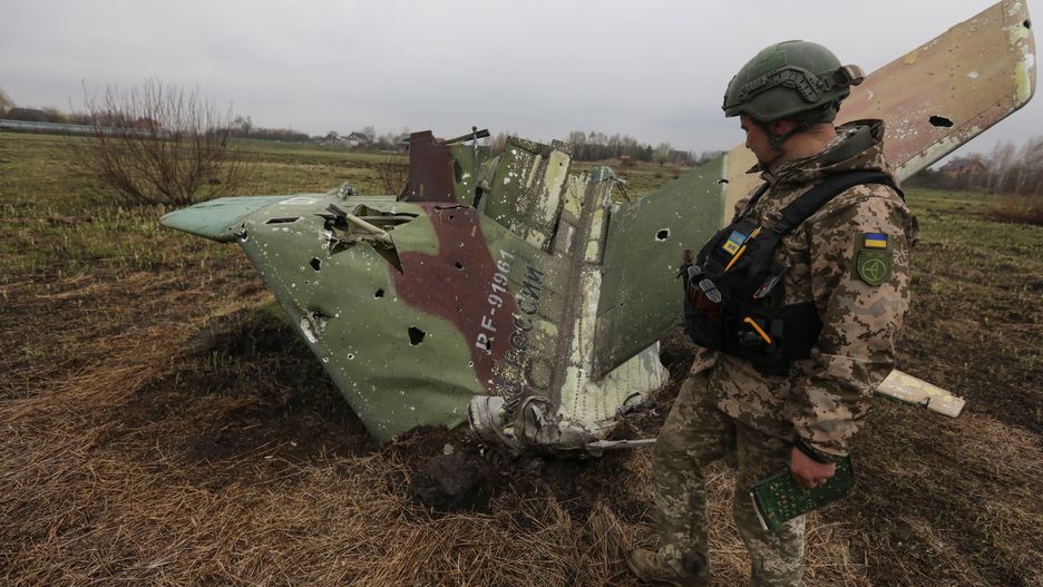 A military sapper inspects remains of a Russian Sukhoi Su-25 fighting aircraft hit by Ukrainian Armed Forces during Russia's invasion in Kyiv Region, Ukraine April 21, 2022