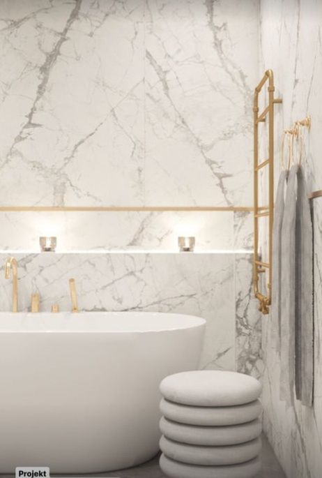Designerski kaloryfer w złotym kolorze i plasterkowy taboret