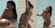 Kylie Jenner w skąpym bikini pręży podrasowane chirurgicznie wdzięki na plaży, tarzając się po piasku (ZDJĘCIA)