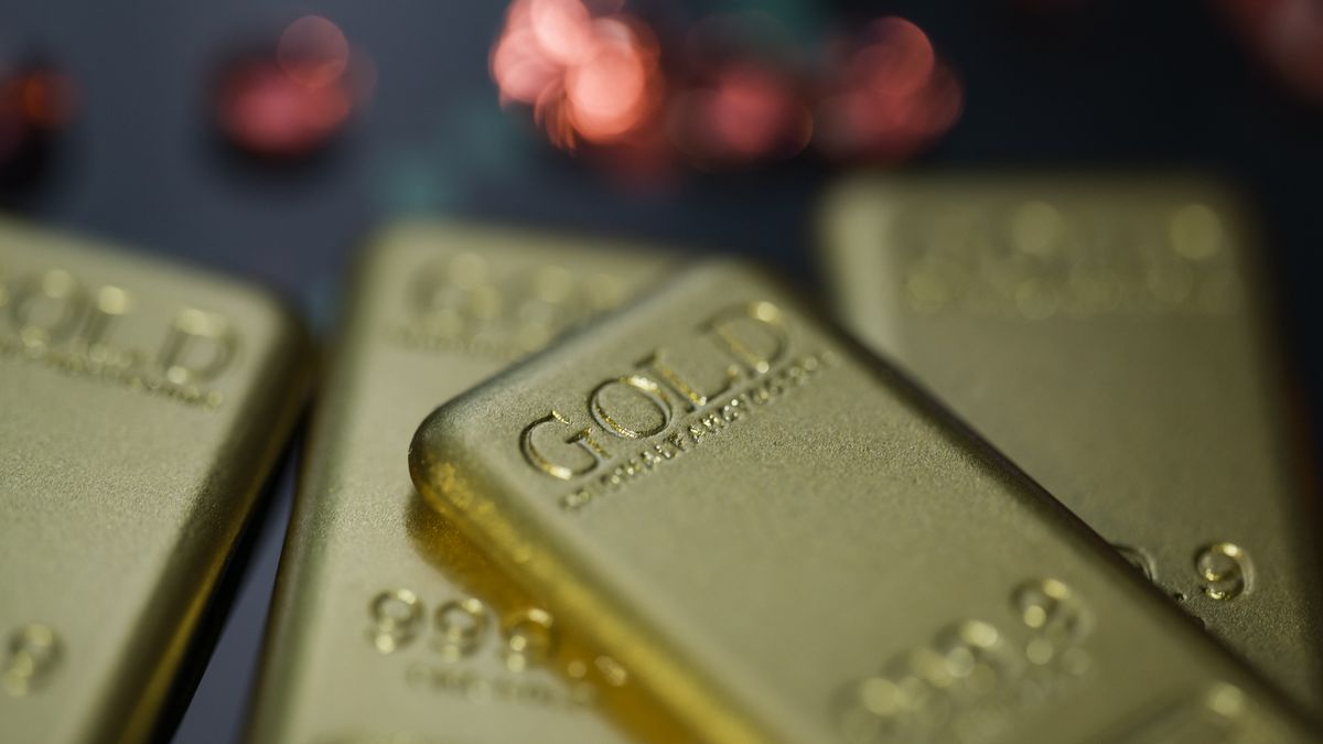 Gold bars are displayed in a photo illustration, reflecting recent movements in gold prices driven by inflation concerns and central bank policy outlooks in Brussels, Belgium, on December 23, 2025. (Photo by Jonathan Raa/NurPhoto via Getty Images)