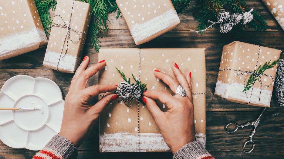 Woman´s hands wrapping Christmas presents on brown paper decorated with painted snow, fir branches and pinecones on a rustic wooden board. Top view
asife
gift, christmas, package, present, paper, eco, brown, box, rustic, holiday, wrap, craft, paper craft, woman, hands, sweater, sleeves, pinecone, snow, painted, paint, funny, string, twine, tied, wrapped, white, ribbon, bow, wooden, xmas, recycling, simple, customize, scissors, ecological, branches, object, merry, original, wrapping, brush, palette, ecological, fir, handmade, handcraft, dotted, decoration, vintage, top view