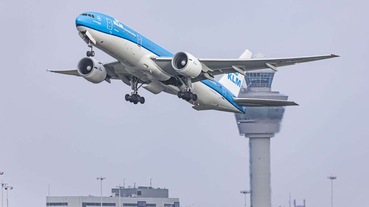 KLM Royal Dutch Airlines Boeing 777-200 passenger airplane as seen during take off and flying from Amsterdam Schiphol Airport AMS EHAM, while passing Infront of the air traffic control power. The wide-body B777 or Triple Seven aircraft has the registration PH-BQC, the name Chichen-Itza and is powered by 2x General Electric GE jet engines. KLM legally Koninklijke Luchtvaart Maatschappij N.V. is the flag carrier airline of the Netherlands, member of SkyTeam aviation alliance group. The carrier is the oldest operating airline in the world with a fleet of 110 planes, part of the Air France - KLM group, with subsidiaries KLM Cityhopper, KLM Asia, Martinair, Transavia, Cygnific. Amsterdam, the Netherlands on January 30, 2023 (Photo by Nicolas Economou/NurPhoto via Getty Images)