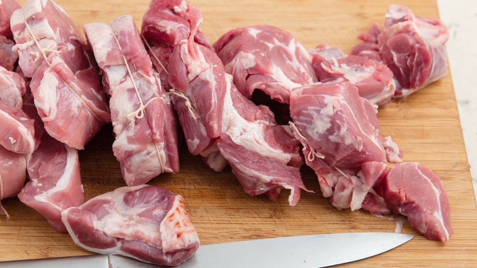 Chopped lamb.
Chopped lamb on wooden chopping board. Kitchen knife. High point of view.
annick vanderschelden photograph
knife