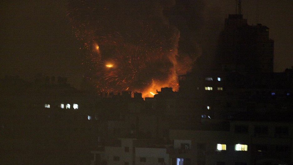 POLITICS CIVIL UNREST
A ball of fire and smoke rise from an explosion on al-Itali apartment tower following an Israeli air strike in Gaza City, in the northern Gaza Strip . Israeli aircraft fired two missiles at a 14-story apartment tower in downtown Gaza City , collapsing the building, sending a huge fireball into the sky and wounding at least 7 people, including 3 children, witnesses and Palestinian officials said. (Photo by Majdi Fathi/NurPhoto) (Photo by NurPhoto/Corbis via Getty Images)
NurPhoto
conflict:CB2, missile:CB2, house:CB2, building:CB2, night:CB2, war:CB2, automobile:CB2, Israel:CB2, Gaza:CB2, Havoc:CB2, destruction:CB1, kids:CB1, palestinian women:CB2, press:CB1, inspects the house:CB2, lantern lighting:CB2