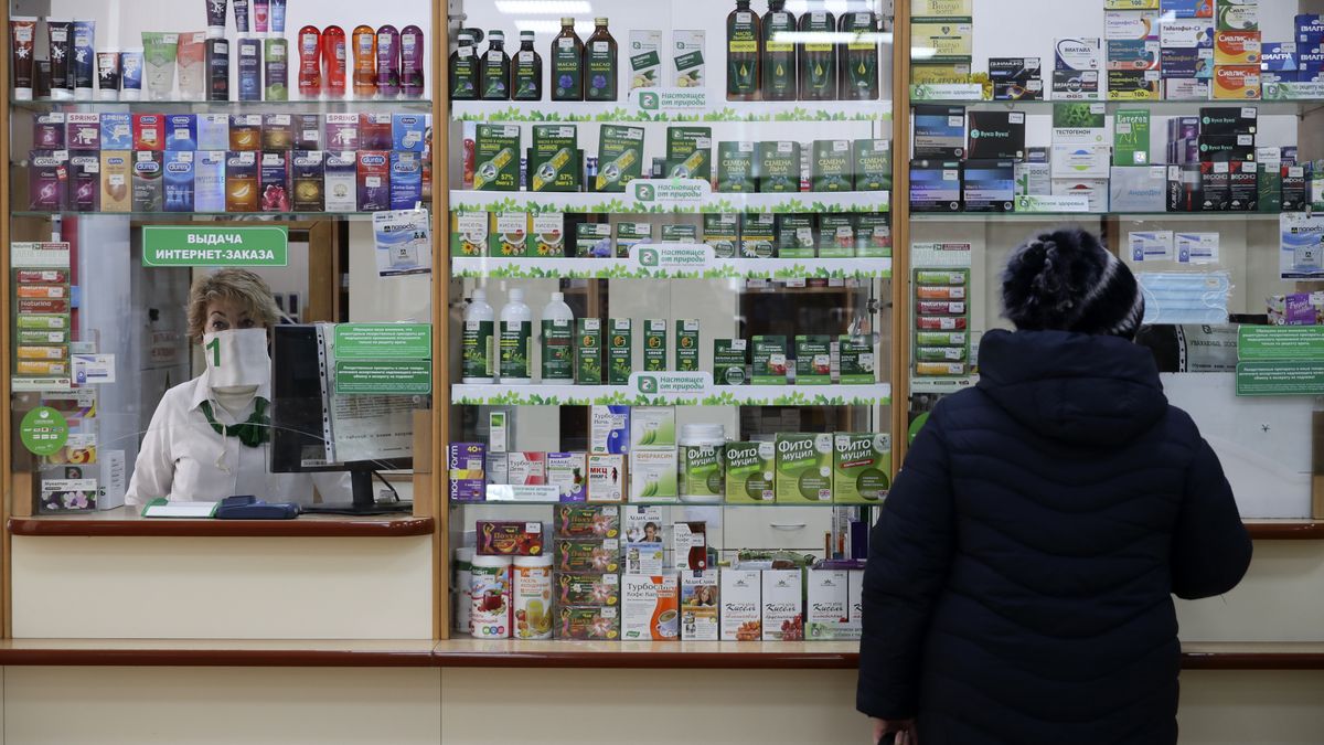 NOVOSIBIRSK, RUSSIA - MARCH 18, 2021: A woman shops for pharmaceutical drugs at an Apteka No 2 pharmacy in Novosibirsk's Tsentralny District. Kirill Kukhmar/TASS (Photo by Kirill Kukhmar\TASS via Getty Images)