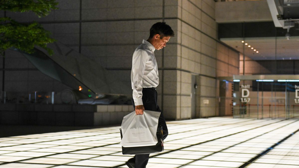 A pedestrian in Tokyo, Japan, on Friday, Aug. 2, 2024. Conditions in Japan's labor market stayed tight in June, a development likely to keep sustained upward pressure on wages as companies compete to hire and retain workers. Photographer: Noriko Hayashi/Bloomberg via Getty Images