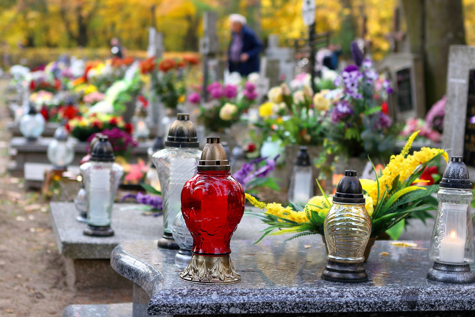 Polish traditional cemetery on the feast of all saints day at 1st November and empty space for text Pawel Horosiewiczcemetery, death, grave, tomb, space, sadness, woman, praying, visiting, dead, husband, kid, father, concept, grave yard, deceased, grieving woman, loss, crying, behind, mother, outdoors, girl, header, child, daughter, brother, family, grandmother, grief, lost, alone, feelings, sad, grandfather, sister, day, copy, graveyard, single, statue, frustration, old, tranquil, spirituality, ancient, scene, worried, religious, loneliness
