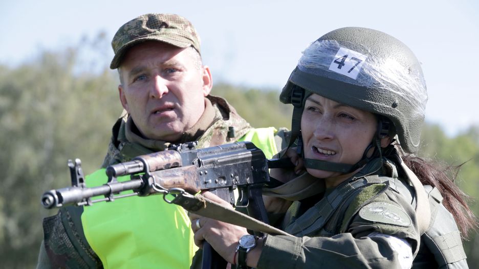 National Guard soldiers compete in Kyiv Region
Junior sergeant Tetiana Atamanchuk-Lepoviak shoots a rifle during the tournament of the National Guard at the base of the Hetman Petro Doroshenko 1st Presidential Task Force Brigade, Vyshhorod, Kyiv Region, northern Ukraine, September 26, 2018. For the first time, female officers of the National Guard take part in the competition. Ukrinform. / (Photo credit should read Pavlo_Bagmut/Future Publishing via Getty Images)
Future Publishing
tournament, National Guard, Ukraine, Military, soldier, woman, rifle, uniform, competition, Hetman Petro Doroshenko 1st Presidential Task Force Brigade