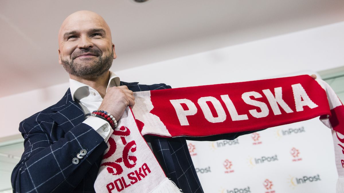WARSAW, MAZOWIECKIE, POLAND - 2022/05/30: Rafal Brzoska, the president of InPost poses with the national team's fan scarf during the press conference. The Polish Football Association officially announced during a press conference at the National Stadium that InPost became the new strategic sponsor.The conference was attended by PZPN's (Polish Football Association) president Cezary Kulesza and Rafal Brzoska, president of InPost, known as Poland's parcel king, who invented the automated e-commerce lockers. It is estimated that approximately 16 million Poles use InPost's automated parcel lockers. (Photo by Attila Husejnow/SOPA Images/LightRocket via Getty Images)