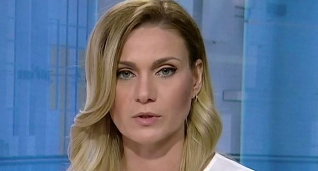 Marta Budzyńska prowadzącą „Raport Dnia” w Polsat News