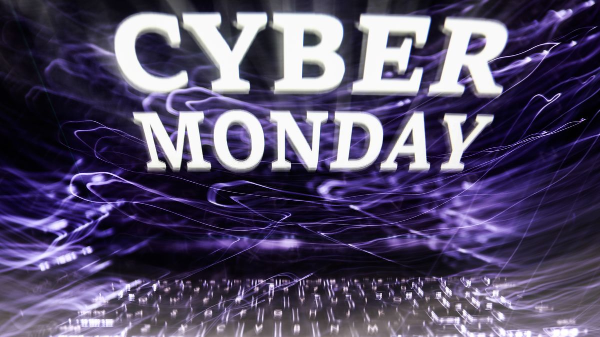 'Cyber monday' sign displayed on a laptop screen is seen in this multiple exposure illustration photo taken in Krakow, Poland on November 28, 2021. (Photo by Jakub Porzycki/NurPhoto via Getty Images)