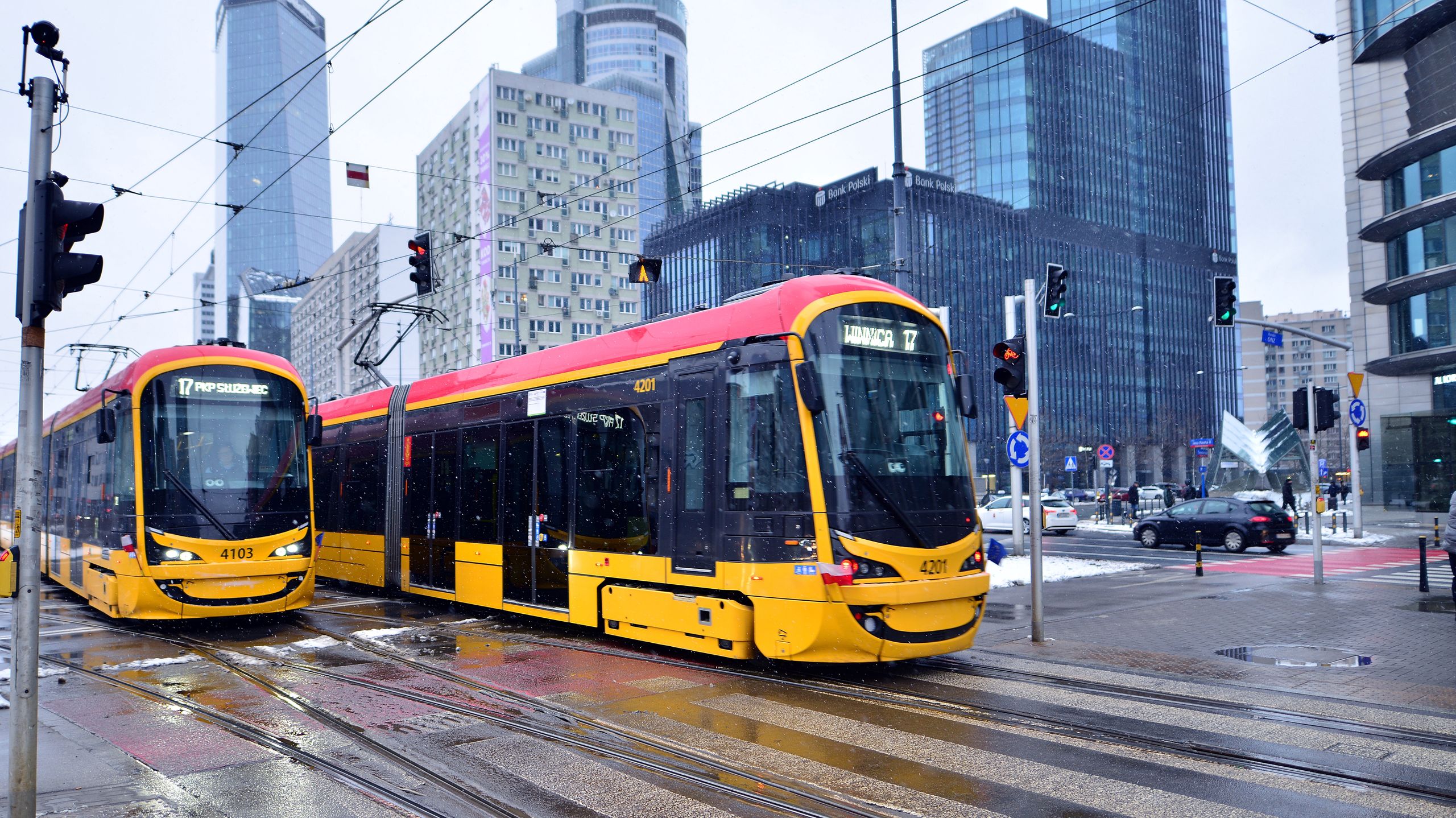 architecture, building, capital, cars, city, city landscape, city traffic, contemporary, downtown, drive, editorial, electric, europe, european, future, glass facades, in the background, infrastructure, line, modern, modern buildings, office buildings, outdoors, passengers, poland, public, railway, road, street, streetcar, tall buildings, technology, tour, tourism, town, tram, tram stop, tramcar, tramway, transport, transportation, travel, urban, vehicle, wagon, warsaw, warsaw tram, winter, yellow