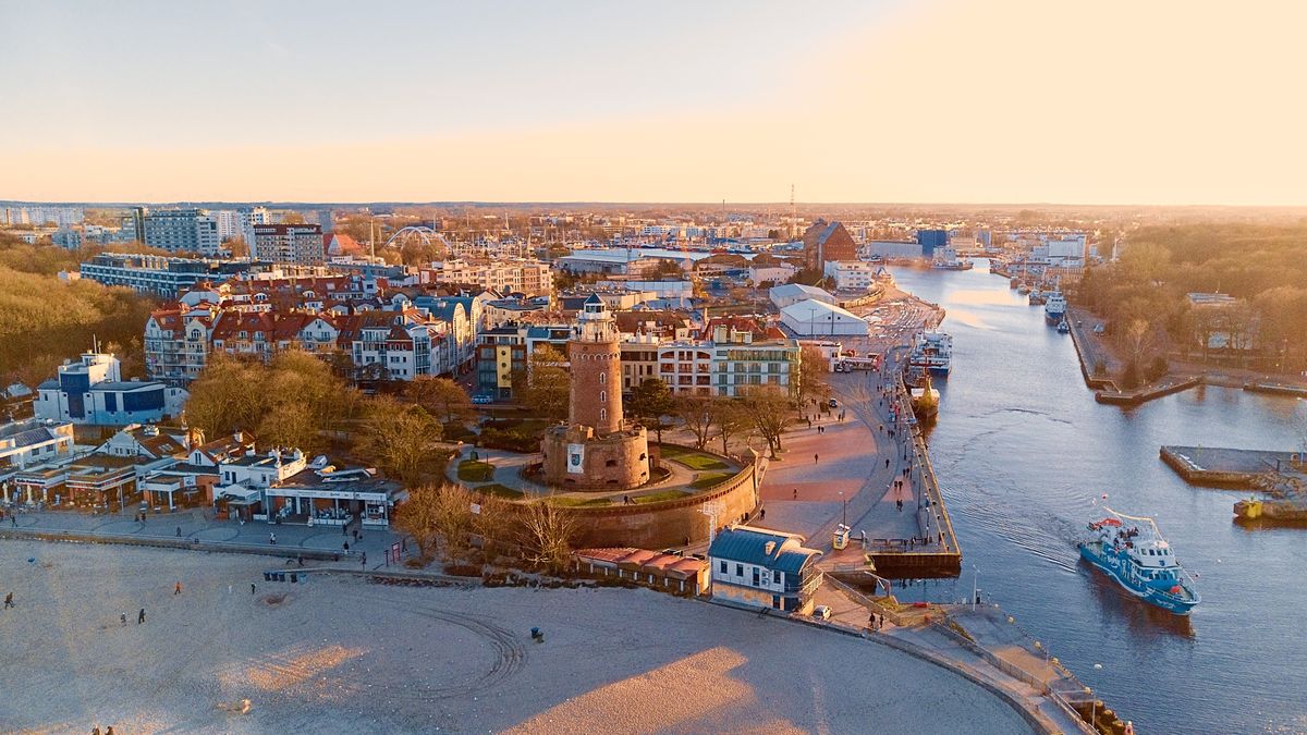 coast line, tower, sunny, signalization, marine, port, sky, water, panorama, aerial photograph, tourism, marina, sailing ship, sailing ships, departure from the port, coast, golden hour, sunset sky, sunset, drone pictures, drone, beach, autumn, harbor, harbour, poland, baltic sea poland, baltic sea, baltic, sea, kolobrzeg, kolberg, lighthouse