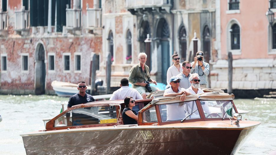 VENICE, ITALY - JUNE 25: Paparazzi follow the Jeff's Besos boat  ahead of Jeff Bezos and Lauren Sanchez Wedding at Hotel Aman on June 25, 2025 in Venice, Italy. (Photo by Ernesto Ruscio/GC Images)
