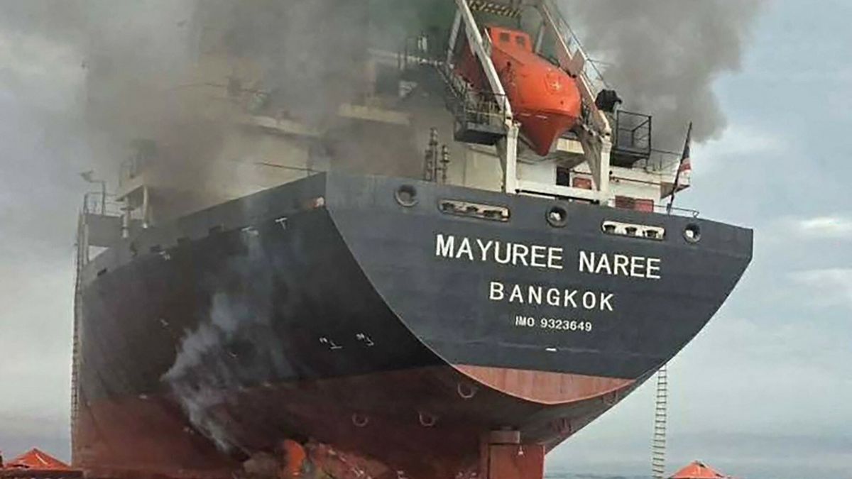 Temporary
TOPSHOT - This handout photo taken on March 11, 2026 and released by the Royal Thai Navy shows smoke rising from the Thai bulk carrier 'Mayuree Naree' near the Strait of Hormuz after an attack. A Thai bulk carrier travelling in the crucial Strait of Hormuz was attacked March 11, with 20 crew members rescued so far, the Thai navy said. (Photo by Handout / ROYAL THAI NAVY / AFP) / -----EDITORS NOTE --- RESTRICTED TO EDITORIAL USE - MANDATORY CREDIT "AFP PHOTO / ROYAL THAI NAVY " - NO MARKETING - NO ADVERTISING CAMPAIGNS - DISTRIBUTED AS A SERVICE TO CLIENTS -
HANDOUT