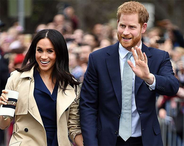 Meghan Markle z ciążowym brzuszkiem i książę Harry w Melbourne