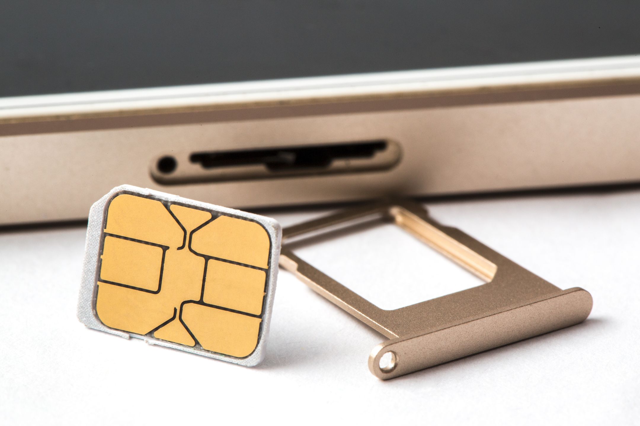 closeup Nano SIM card ready to insert to smart phone 