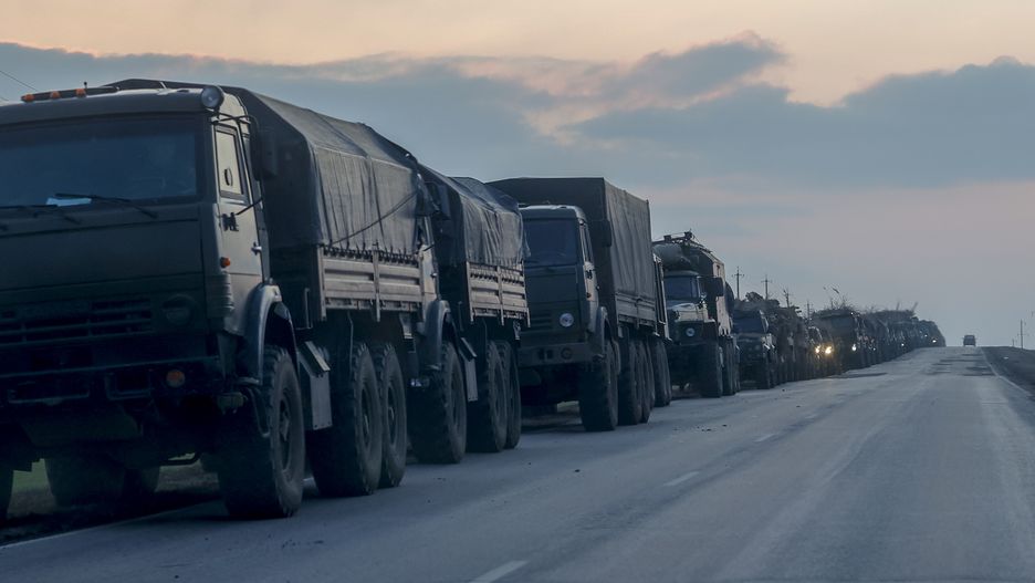 ROSTOV, RUSSIA - FEBRUARY 23: A convoy of Russian military vehicles is seen as the vehicles move towards border in Donbas region of eastern Ukraine on February 23, 2022 in Russian border city Rostov. (Photo by Stringer/Anadolu Agency via Getty Images)