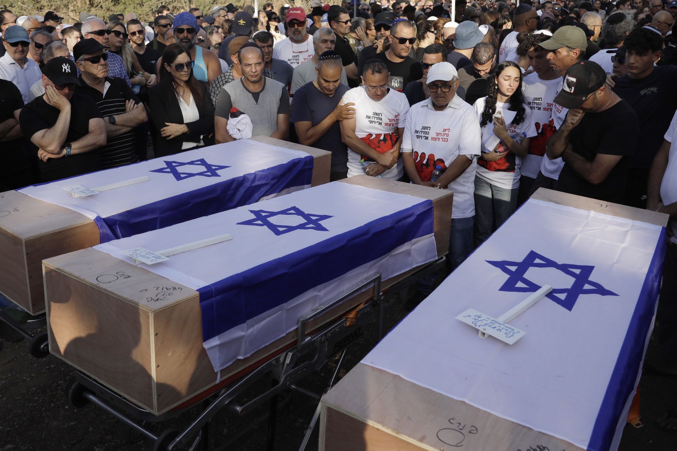 Funeral Held For Members Of Sharabi Family, Killed After Attack On Kibbutz Be'eriKFAR HARIF, ISRAEL - OCTOBER 25:  Mourners attend the funeral for members of the Sharabi family, who were killed in the attack on Kibbutz Be'eri on October 25, 2023 in Kfar HaRif, Israel. British citizens Lianne Sharabi and her two daughters, Yahel and Noiya, were were initially reported missing after Hamas fighters raided their home in Kibbutz Be'eri in southern Israel on October 7. The three were later confirmed dead. Lianne's husband and the girls' father, Eli Sharabi, is still missing, as is Eli's brother Yosi. (Photo by Amir Levy/Getty Images)Amir Levybestof, topix